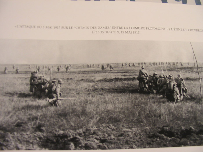 Photo taken during an actual assault. The column in the foreground waits in reserve as echeloned waves of assault troops advance.