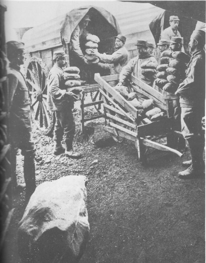 Bread produced by field bakeries being distributed to the 'cooks'.