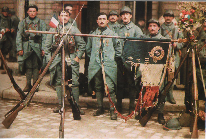 These men pose with their regimental flag in a rare color photo.
