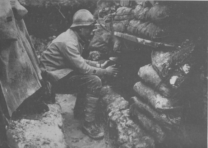 A small cooking fire in a trench.