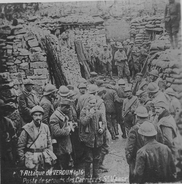 Fench first-aid post with German prisoners helping out. Saint Vaast Quarries, Verdun.
