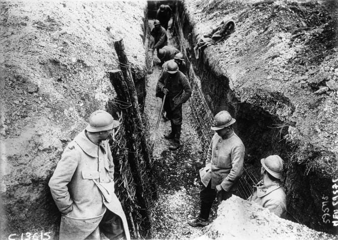 A group of telephonists laying out telephone wire.