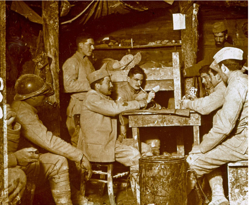 French troops playing cards in a bunker.