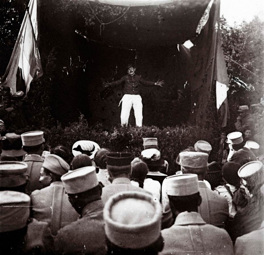 A soldier performing in a military theater in 1915.