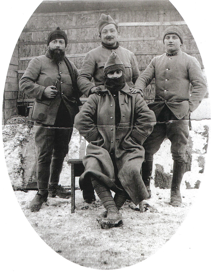 A group of men wearing cold weather gear.