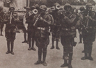 An American military band playing in July 1918. These are black American troops who served in US army units assigned to French divisions (note their French equipment).