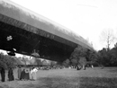 Curious civilians go to check out a downed zeppelin.
