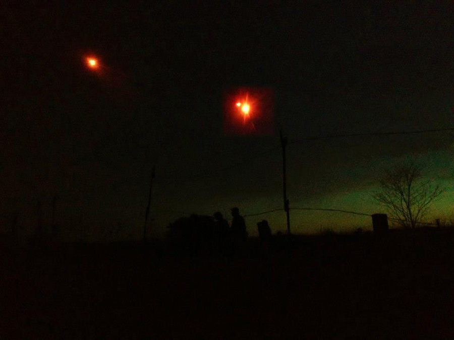 Flares slowly shoot over the battlefield, April 2014.