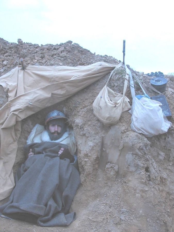 Sgt. Contamine, at dawn in a shelter after a long, rainy night - Newport News, VA, March 2005