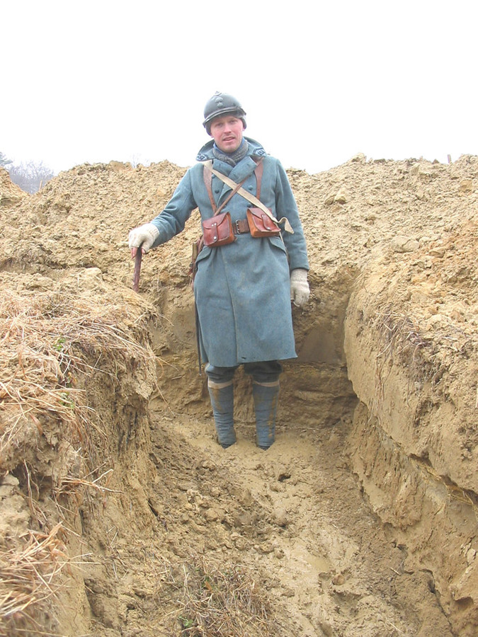 Mathieu William, plodding through a mud-filled trench - Newport News, VA, March 2005