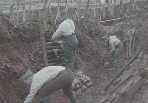 Working on the trench under wire-netting camouflage, November 2006.