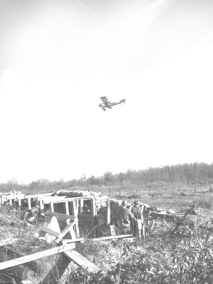 The Sopwith Camel makes another pass over the German lines as two poilu look on, November 2006.