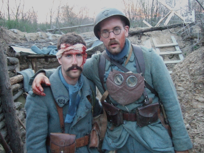 Sgt. Contamine and Sdt. Schech help each other back to the first-aid post following an attack, April 2008.
