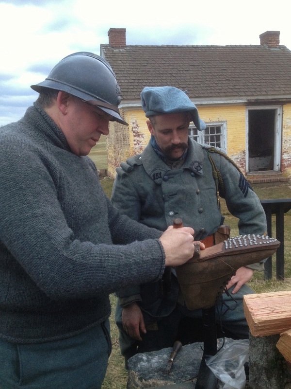 Sdt. Croissant and Sgt. Contamine work on installing hobnails. Fort Mifflin, March 2013.