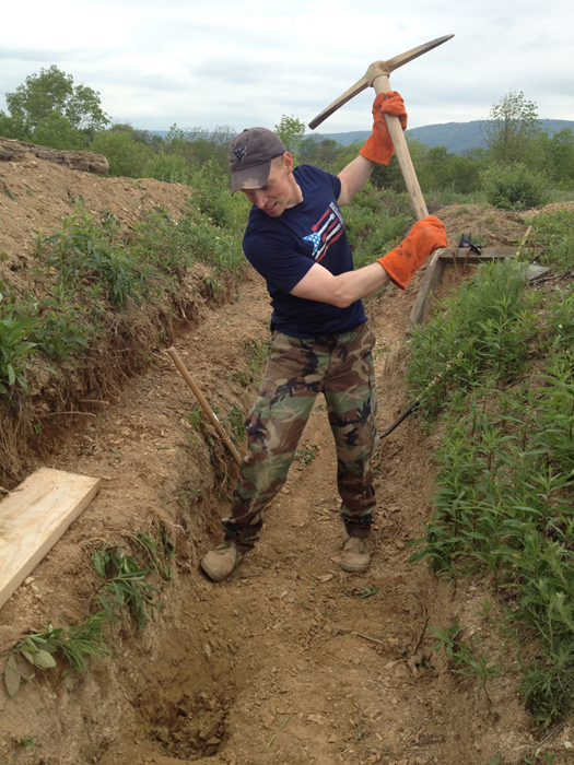 Sdt. Nicolas working on the second line trench during the French company work weekend. Newville, September 2013.
