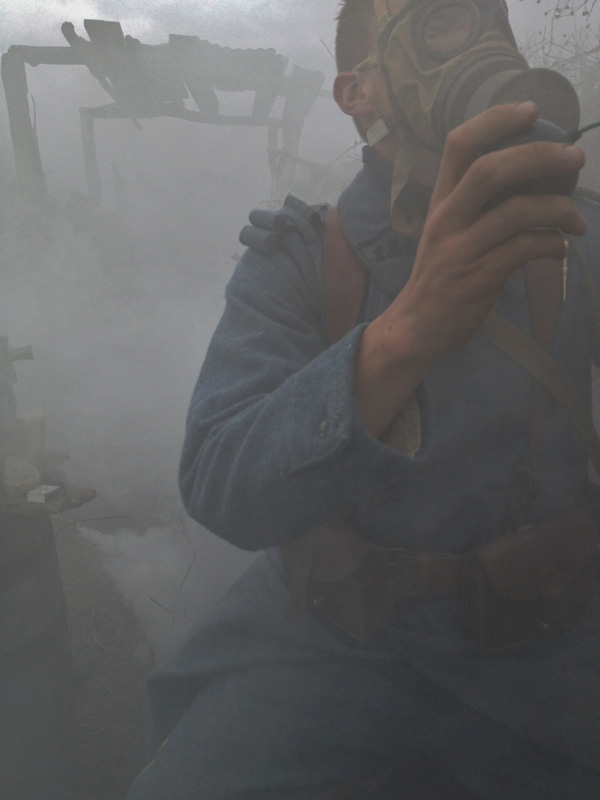 The 151 under gas and smoke attack. Sdt. Nicolas secures his gas mask. Newville, November 2013.