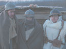 Dawn--three cold, weary soldiers after having caught only a few hours rest in the trenches, April 2005.