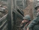 Sdts. Fagot and Hauser have a smoke next to a collapsed section of trench, April 2003.