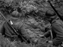 Poilus demonstrate to American trainees how to progress through a trench using hand grenades, April 2010