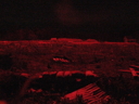 A flare illuminates no-man's-land, November 2010.