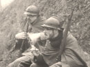 Two poilus of the 18th R.I. have a sit in a conquered German trench, April 2011.