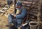 Sdt. Rouland takes advantage of a quiet moment to write a letter. Newville, November 2013.