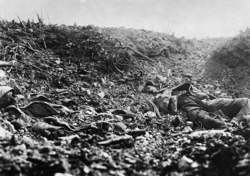 The half-buried, decaying bodies of French soldiers at Verdun.