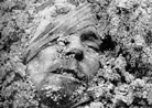 A wounded French soldier killed and mostly buried by a shell blast. Verdun 1916.